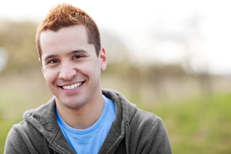 Smiling Patient with Tinnisense Dental Aligner Care, a Superior Dental Care Treatment
