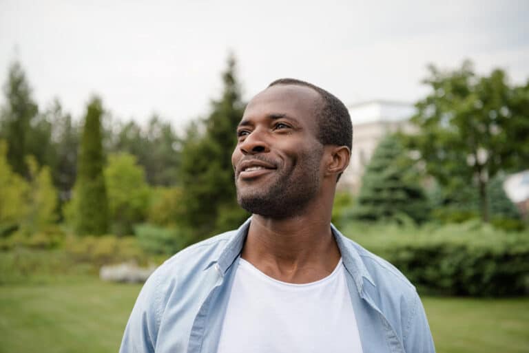 TMJ - Temporomandibular joint - TMD, gum graft surgery and Jaw Pain - African American smiling after getting relief